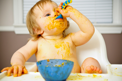 giving baby cereal