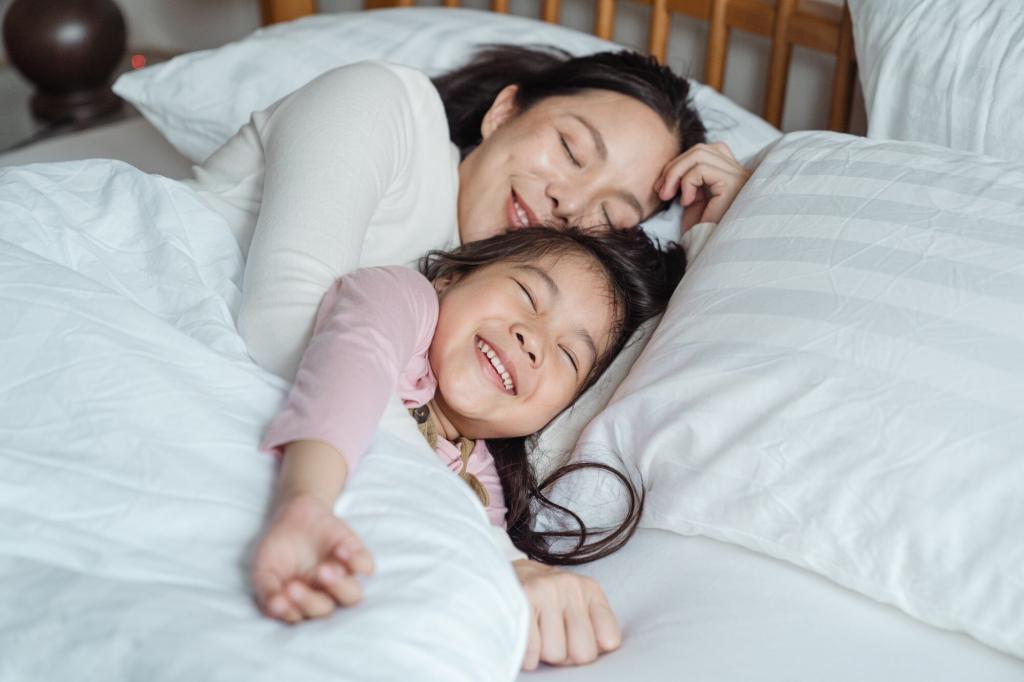mom and child happy resting in bed