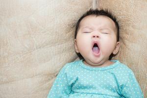 Yawning Baby - Baby Sleep Schedules With Feeding by Age