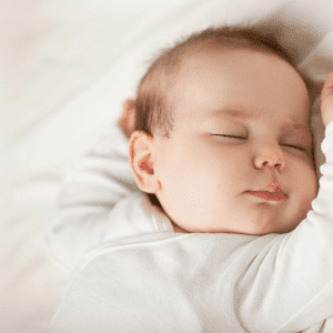 Sleeping Baby with arm near face